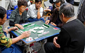 Family gambling at mahjong