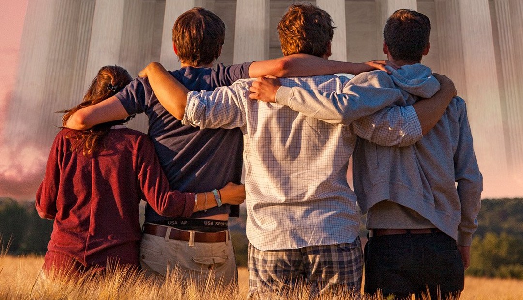 Four young people stand together with their arms around each other, facing a great columned courthouse in the clouds
